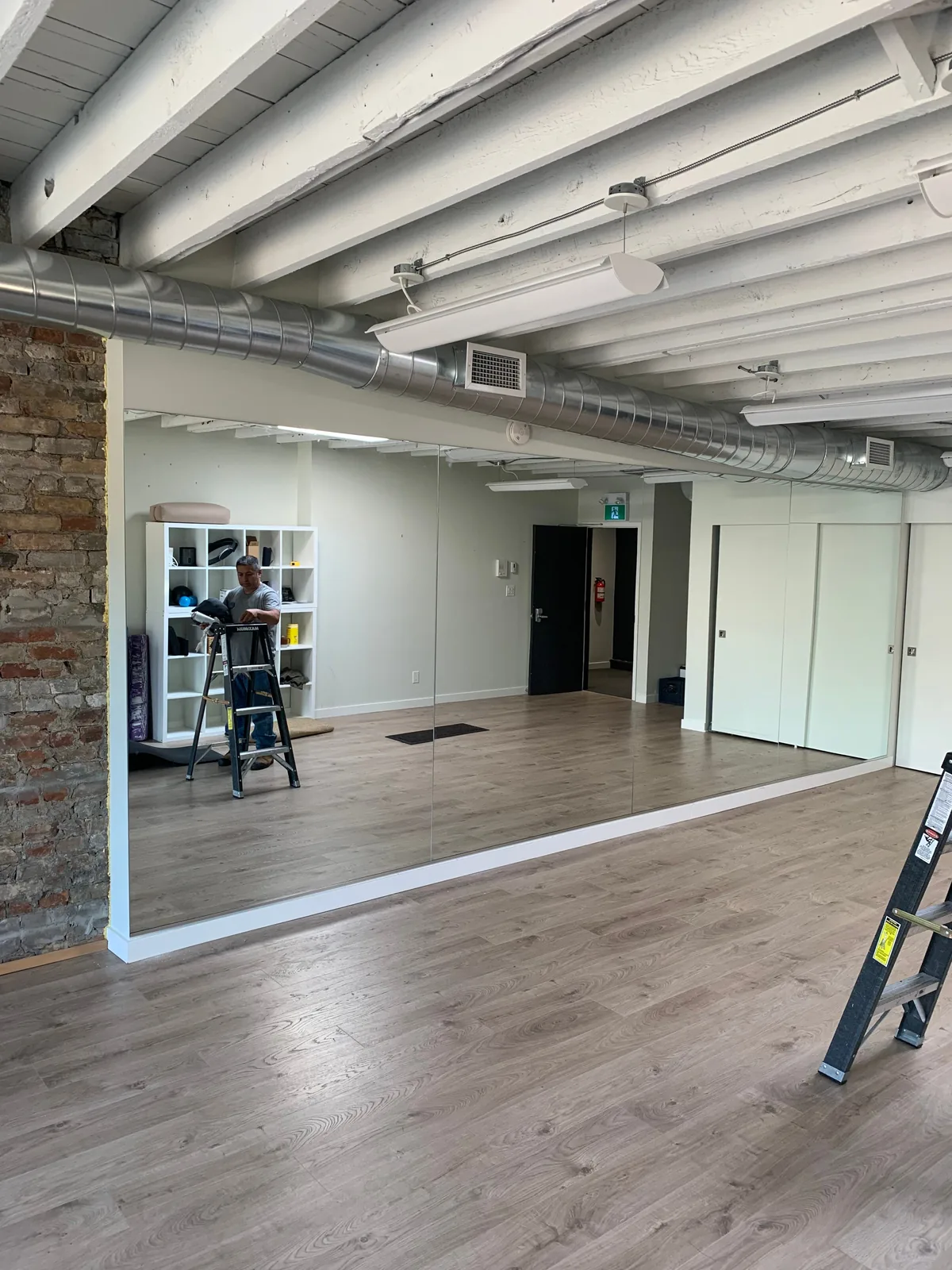 Custom mirror wall installation
