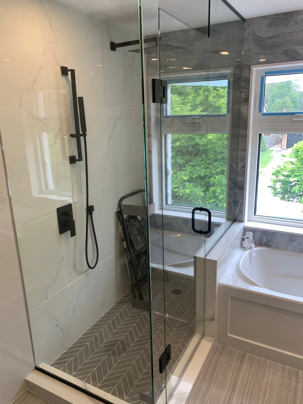 Glass shower enclosure