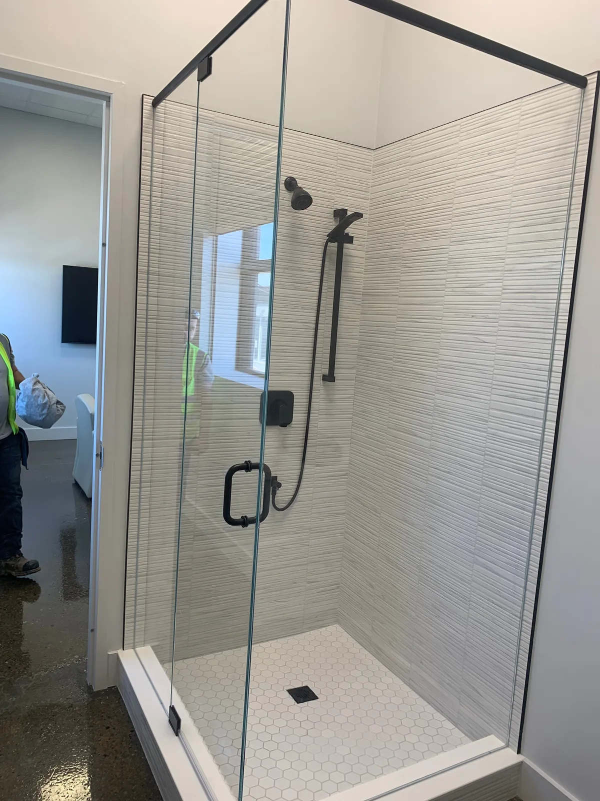 Glass shower enclosure